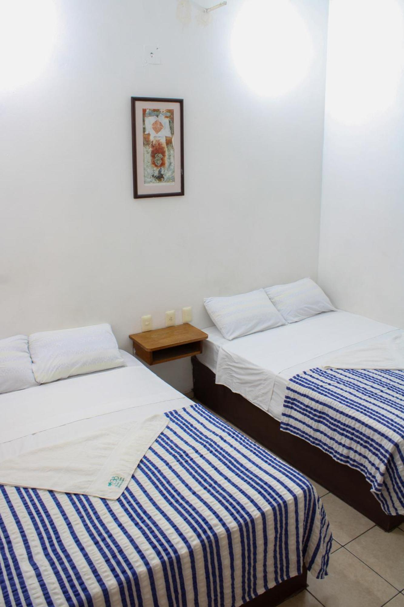 Hotel Om Downtown Санта Крус Уатулко Екстериор снимка